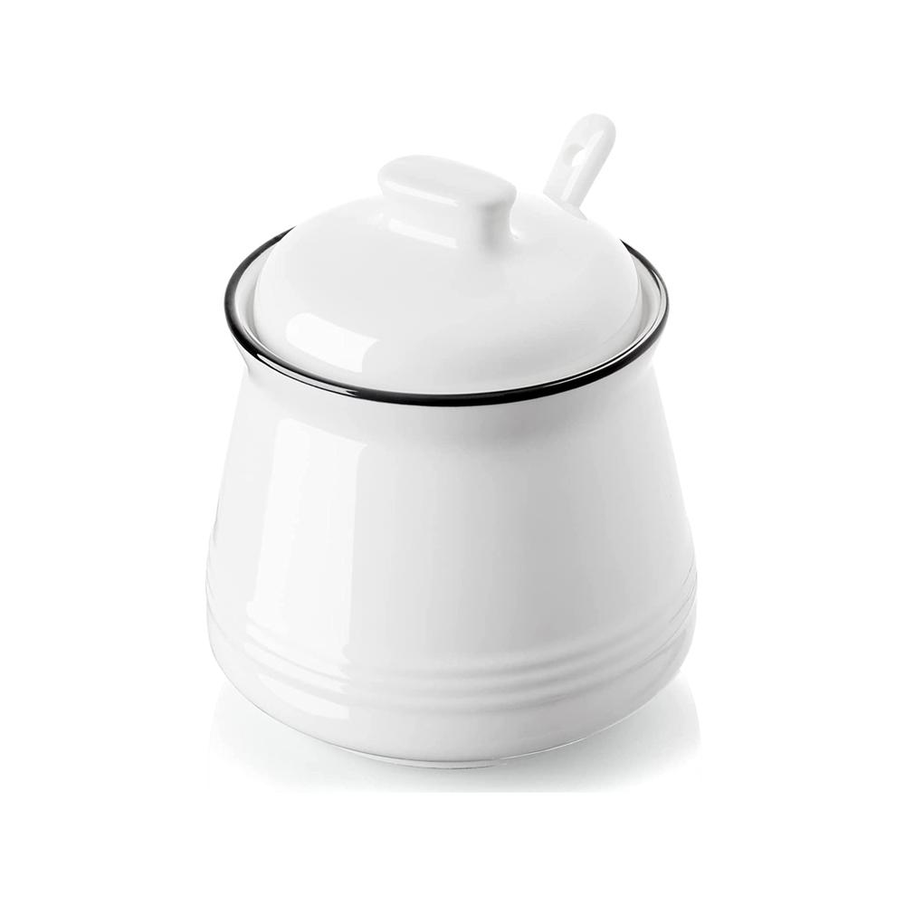 white ceramic sugar pot with lid and spoon